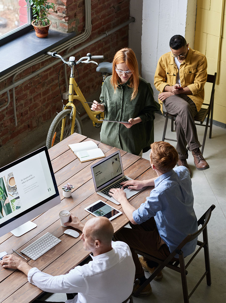 three people in a meeting